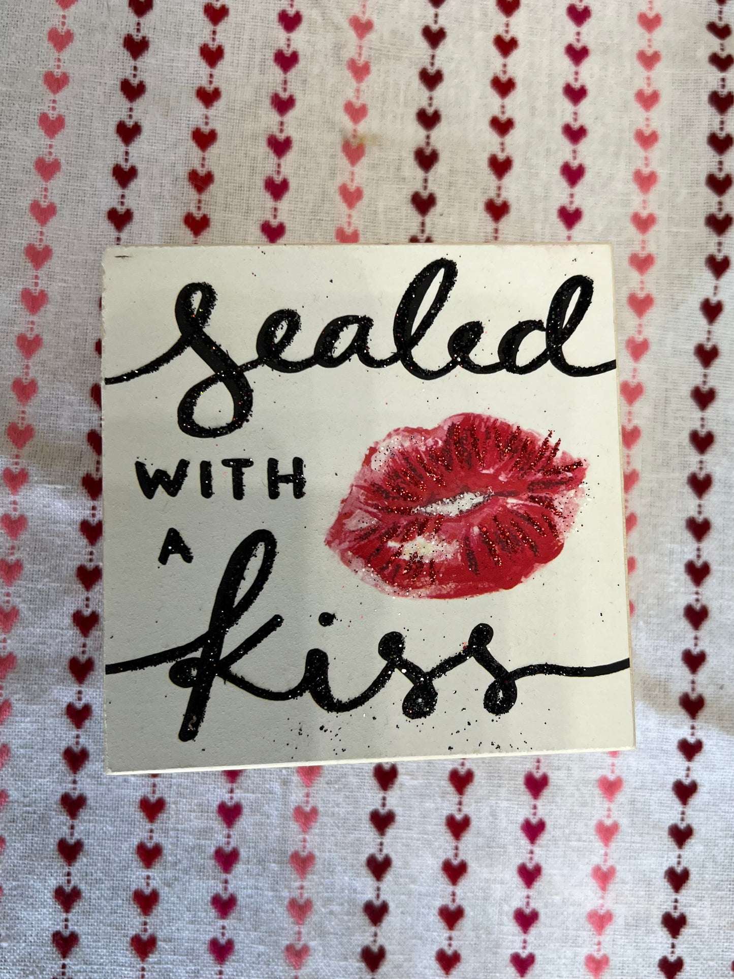 Sealed with a kiss box sign