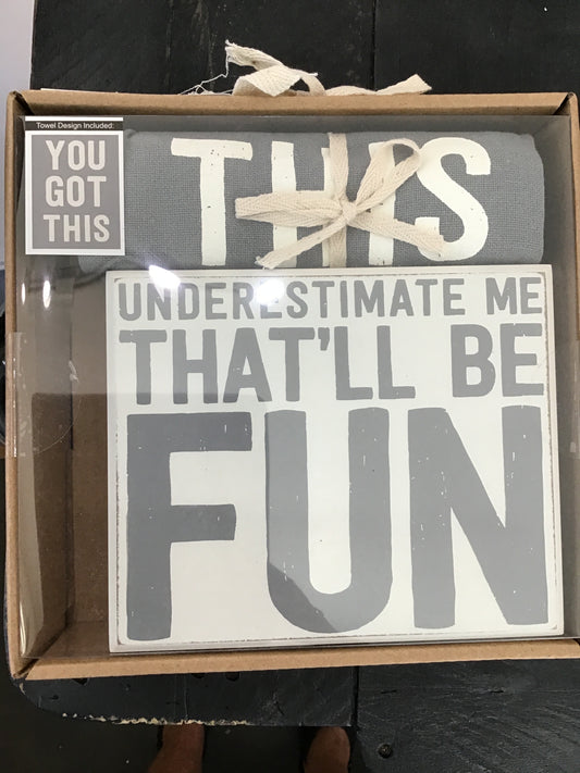 “Underestimate me that’ll be fun” box sign and towel set